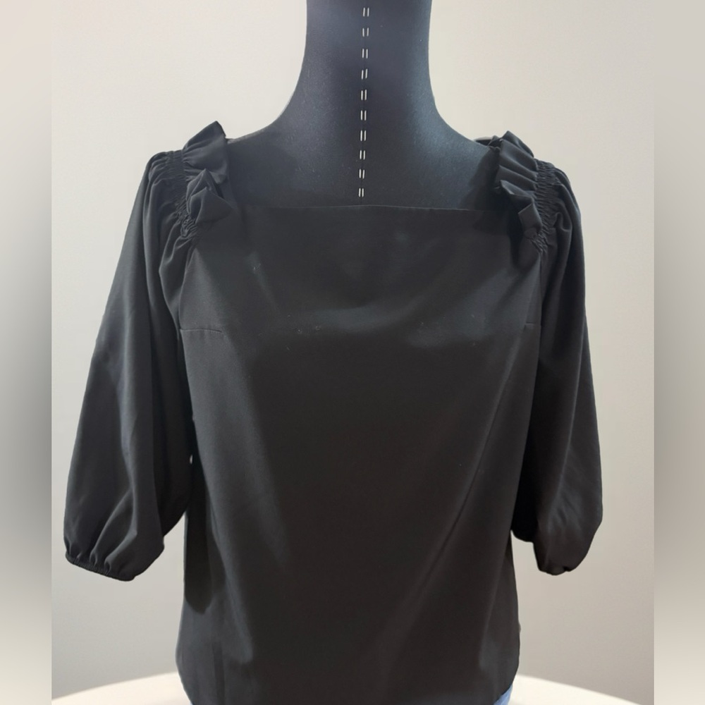 The Vanity Room Black Ruffled Blouse